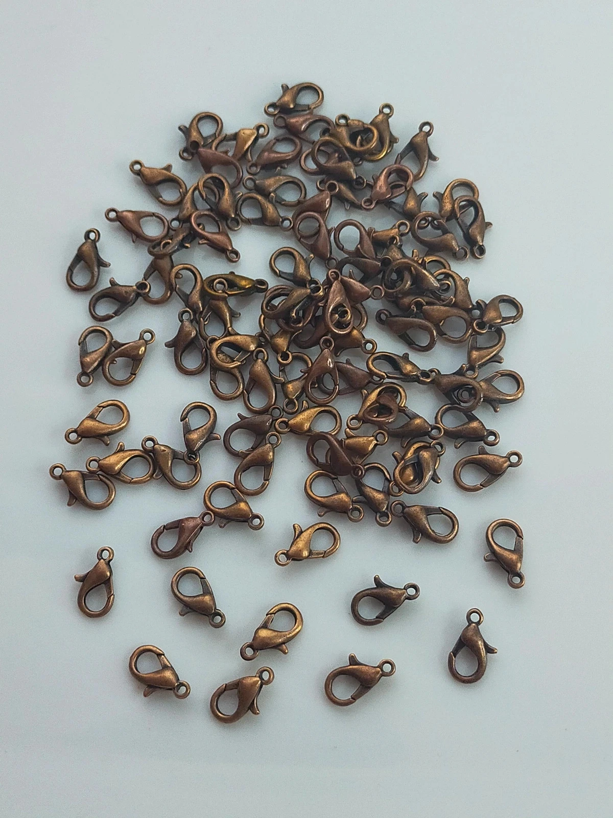 Mousquetons fermoirs x100 cuivrés en métal Lot n°4924